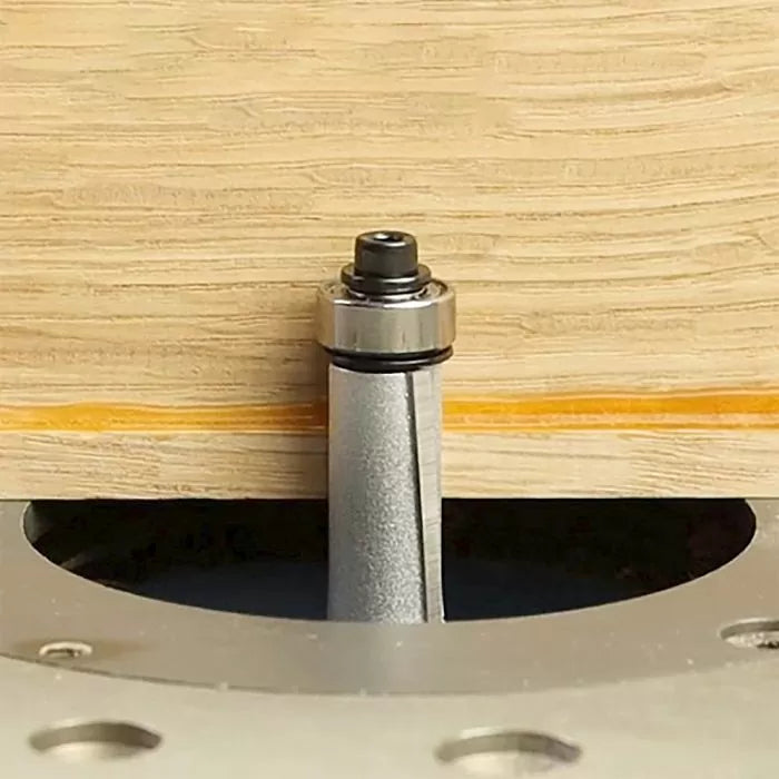 Straight flush trim router bit cutting plywood on router table