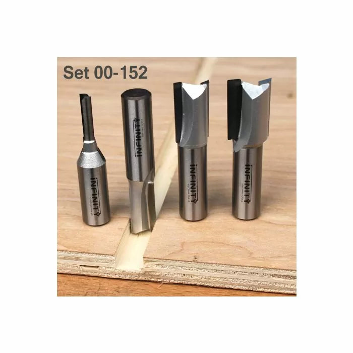 Woodworking router bit set 00-152 with four steel bits on plywood surface for precise cuts