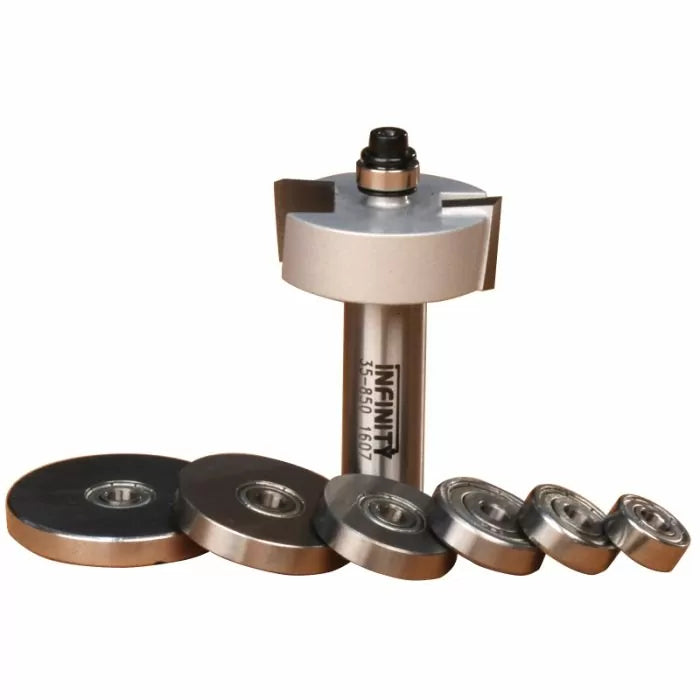 Woodworking slot cutter router bit with six interchangeable bearings on white background