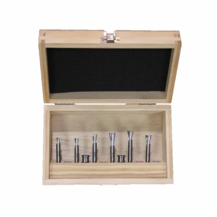 Woodworking router bit set in open wooden case, precision tools for cutting and shaping wood