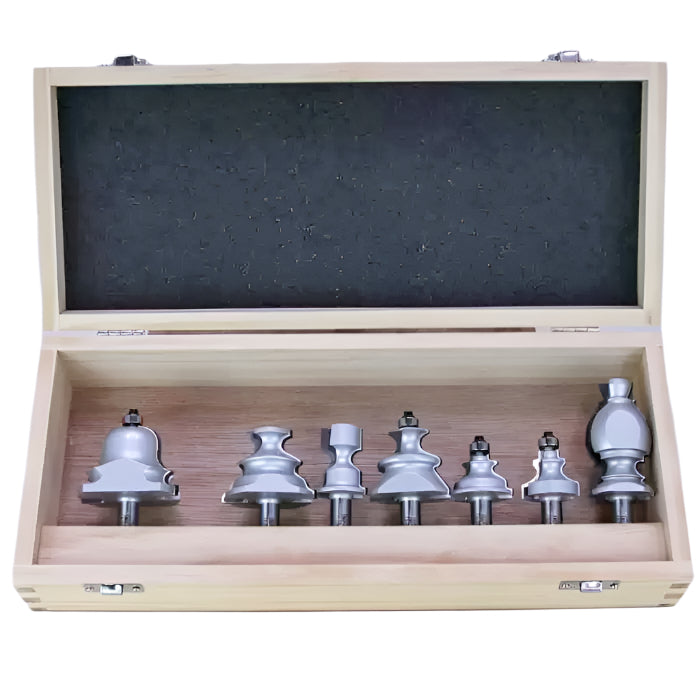 Woodworking router bit set in wooden case, six steel bits organized in a row