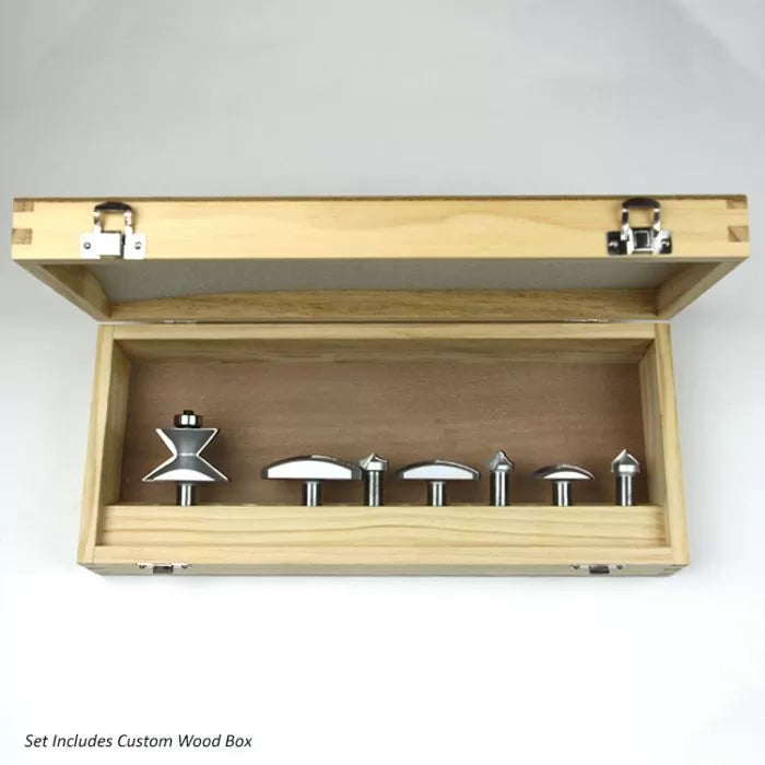 Woodworking router bit set in custom wooden box, ideal for precision cutting and shaping.