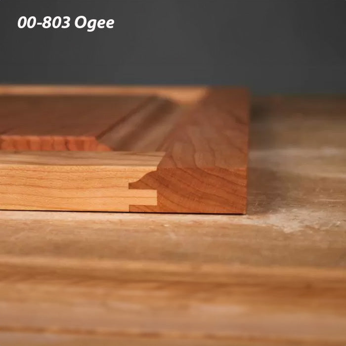 Wood panel with 00-803 ogee edge profile and dovetail joint on a woodworking table