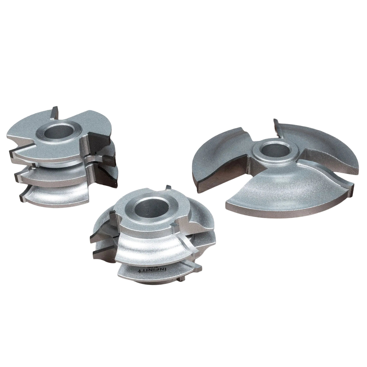 Ogee shaper cutter set for woodworking, three carbide-tipped cutting heads on white background