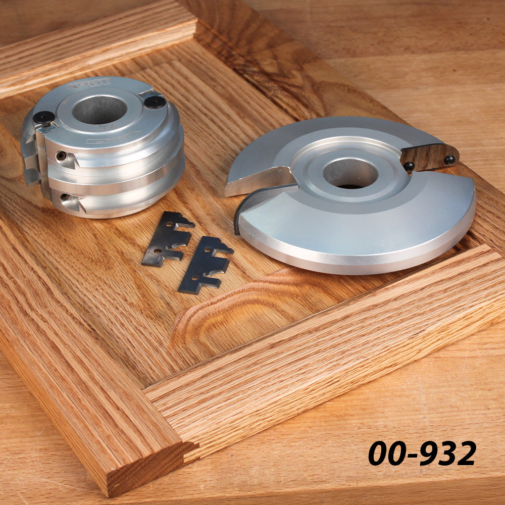 Carbide-tipped molding cutter heads and blades on oak cabinet door sample, woodworking tools