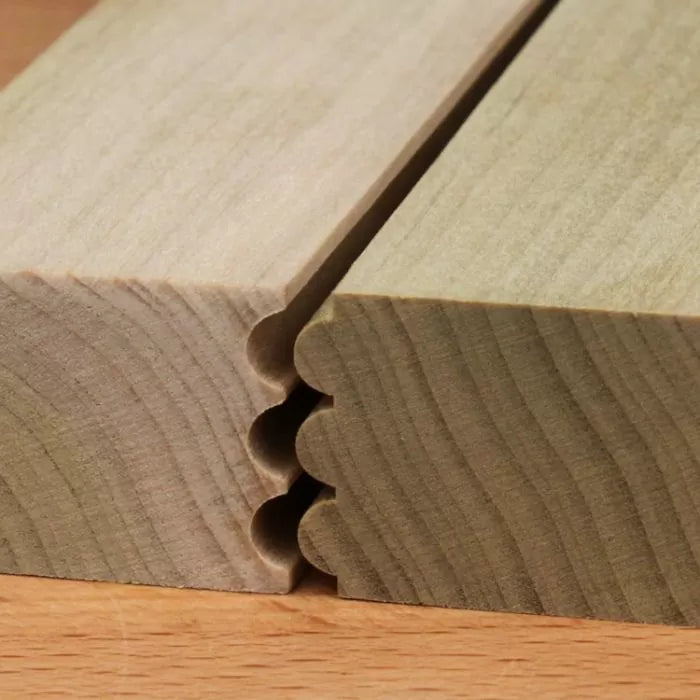 Close-up of wood boards with a multi-bead router joint for precise woodworking joinery