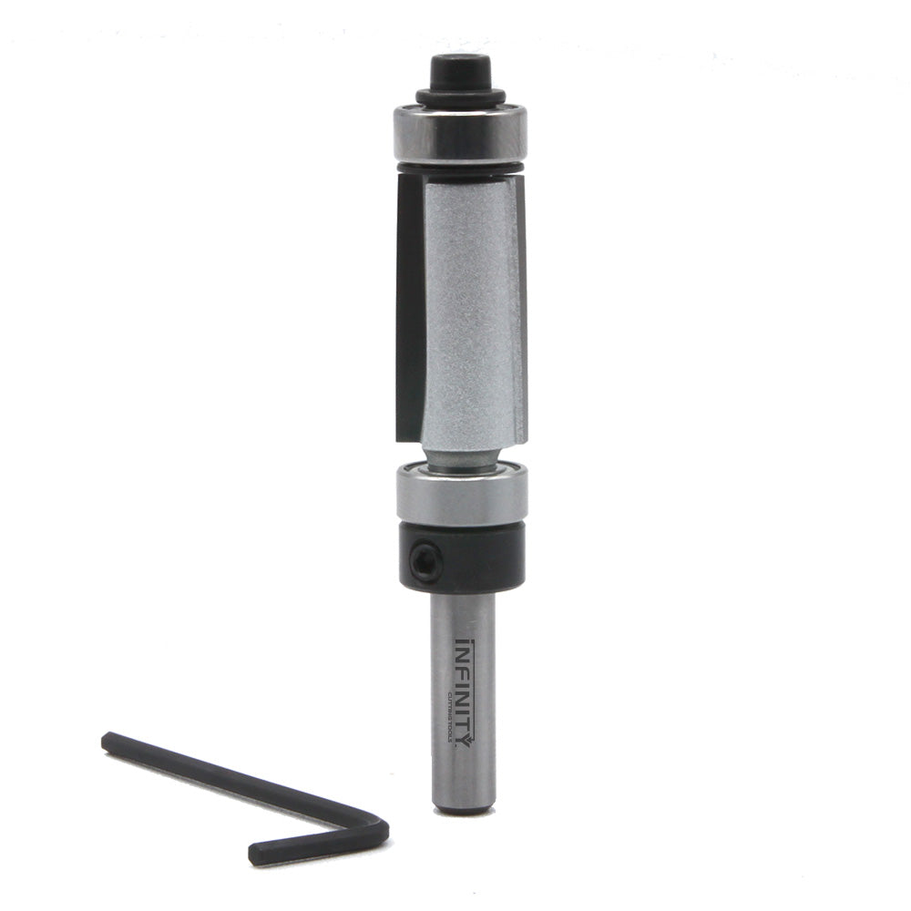 Carbide router bit with bearing and hex key for woodworking, isolated on white background.