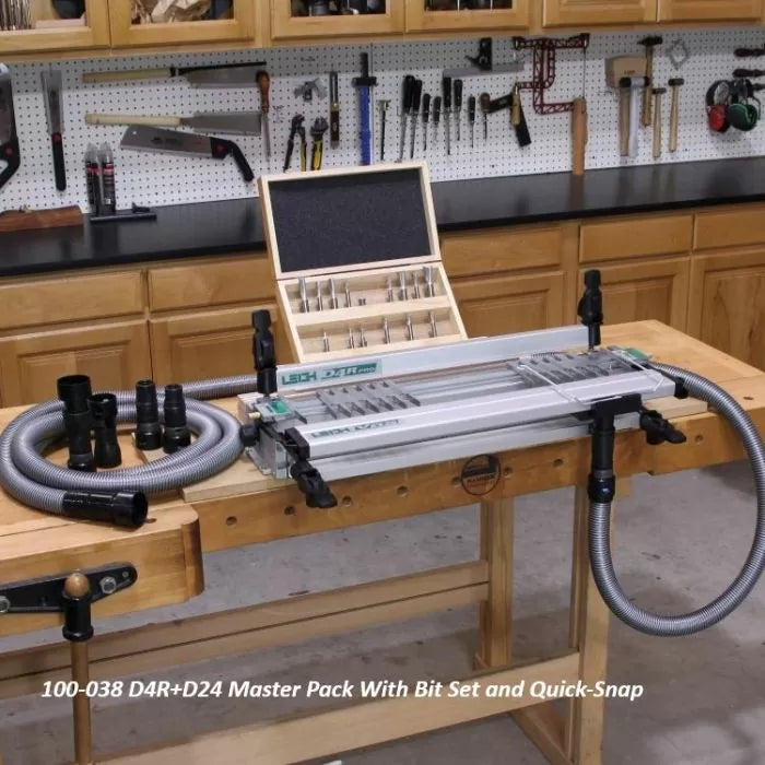 Dovetail jig system with bit set and hose attachments on workbench in woodworking shop