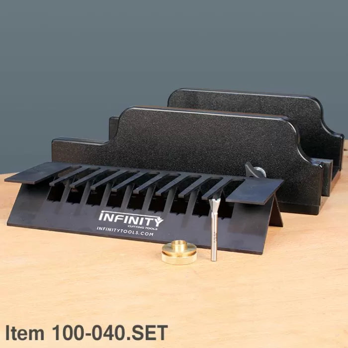 Router table jig set with featherboards, router bit, and brass guide on wood surface