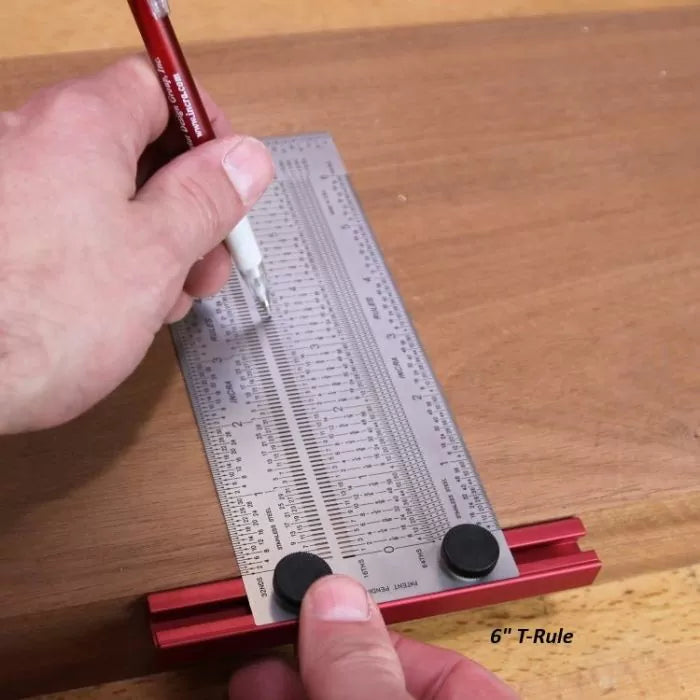 6-inch T-rule marking precise lines on a wooden board for woodworking measurements.