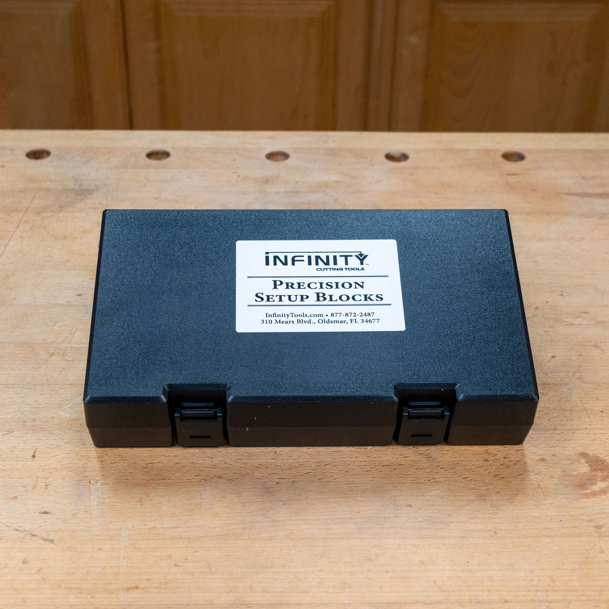 Closed Infinity Tools Precision Setup Blocks storage case on a workbench