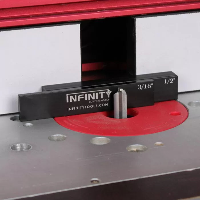 Router table setup gauge with metal fence and straight router bit for woodworking precision