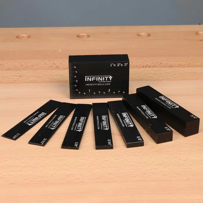 Woodworking setup blocks set on workbench, precision measurement tools displayed.