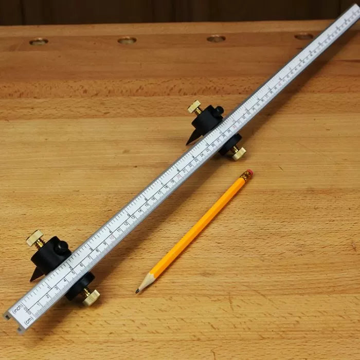 Woodworking marking gauge with adjustable ruler and pencil on workbench