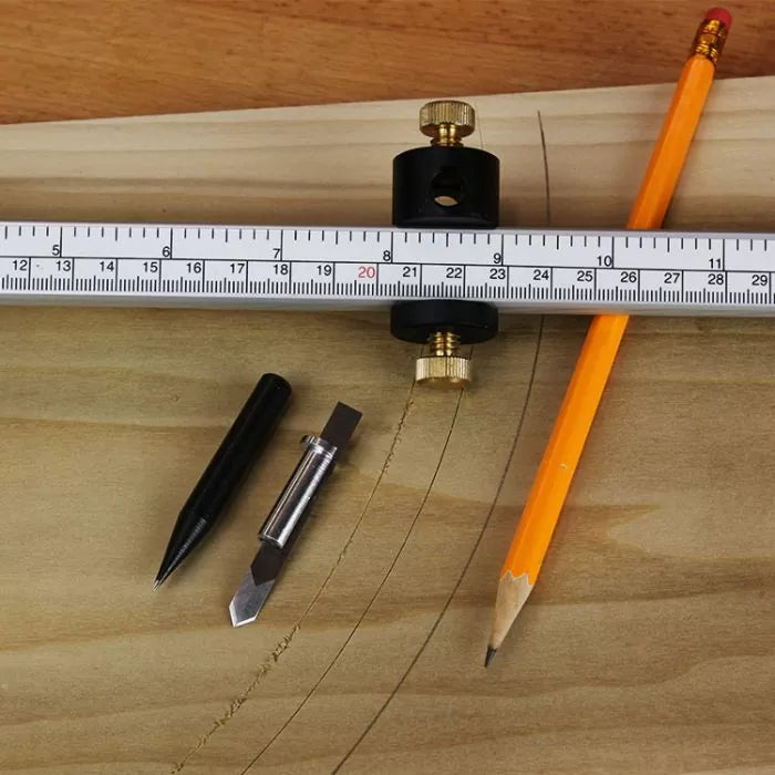 Circle cutting jig with ruler, pencil, and marking blades on wood for woodworking precision