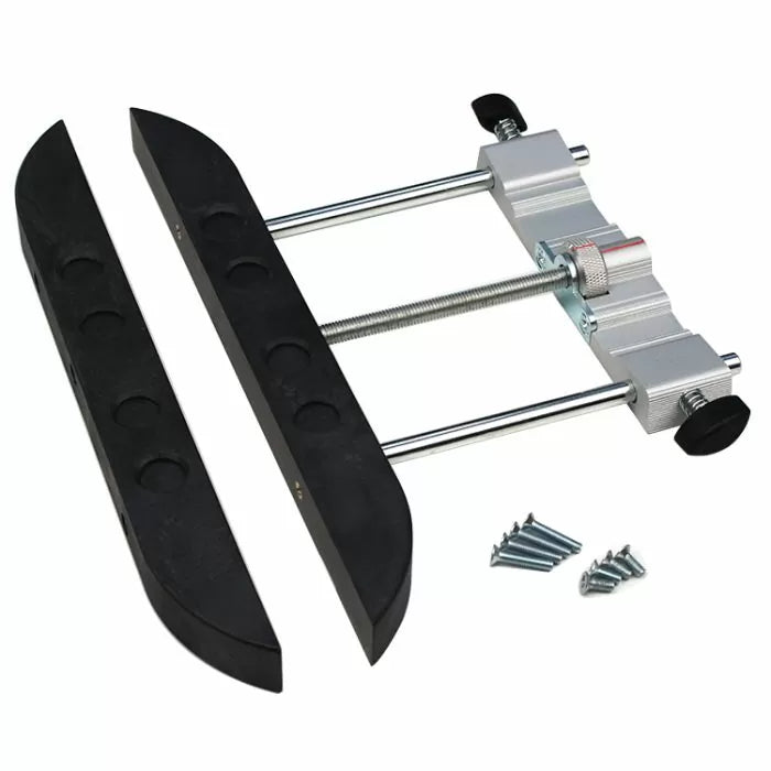Precision woodworking clamp with rubber jaws and mounting screws on white background