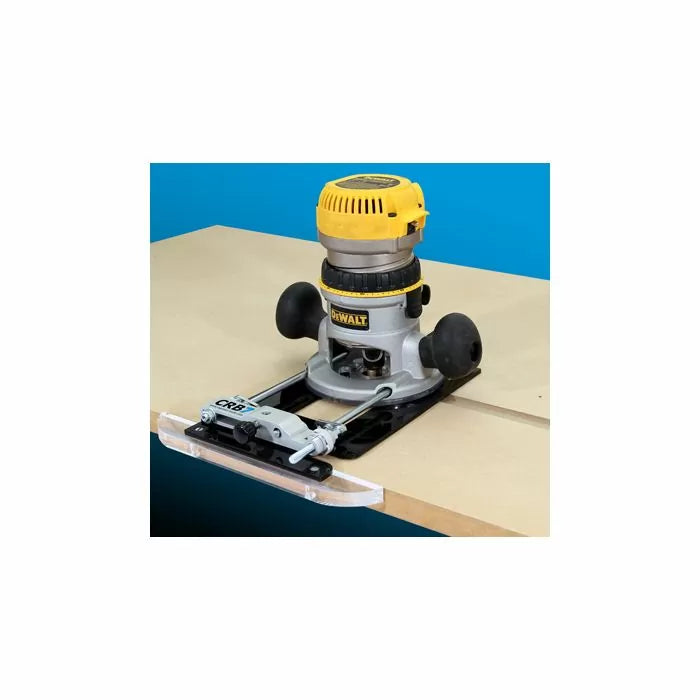 Woodworking router with edge guide attached to a work table for precision cutting