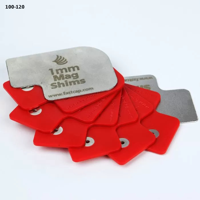 Set of red and silver 1mm magnetic shims for woodworking, fanned out on white background.