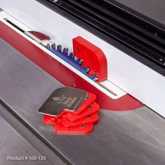 Table saw blade setup with red metal shims for precise woodworking adjustments