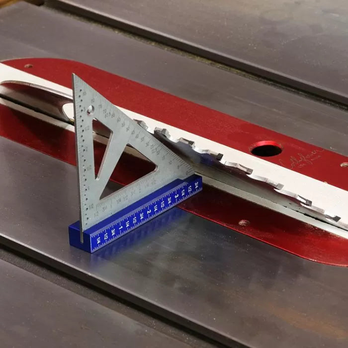 Precision drafting triangle and ruler measuring table saw blade angle on metal saw table