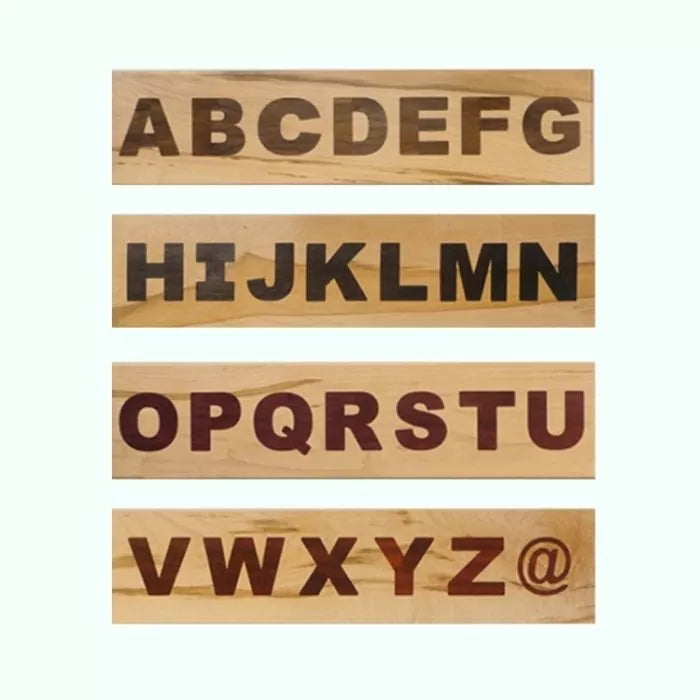 Wood letter template set with uppercase alphabet and @ symbol for woodworking projects