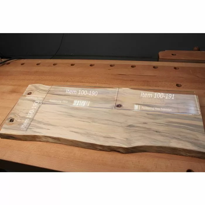 Wooden workbench with natural edge routing plate insert and extension, labeled item 100-190 and 100-191