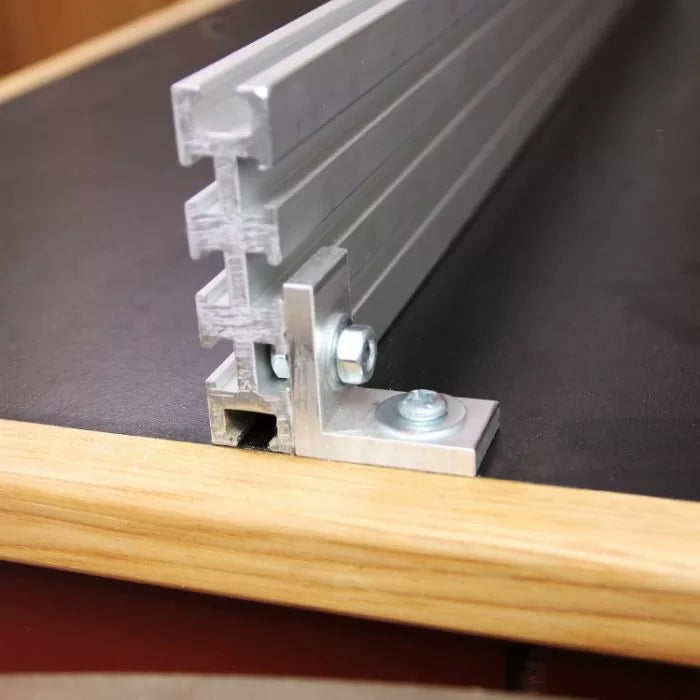 Aluminum T-track installed on workbench corner, woodworking table accessory