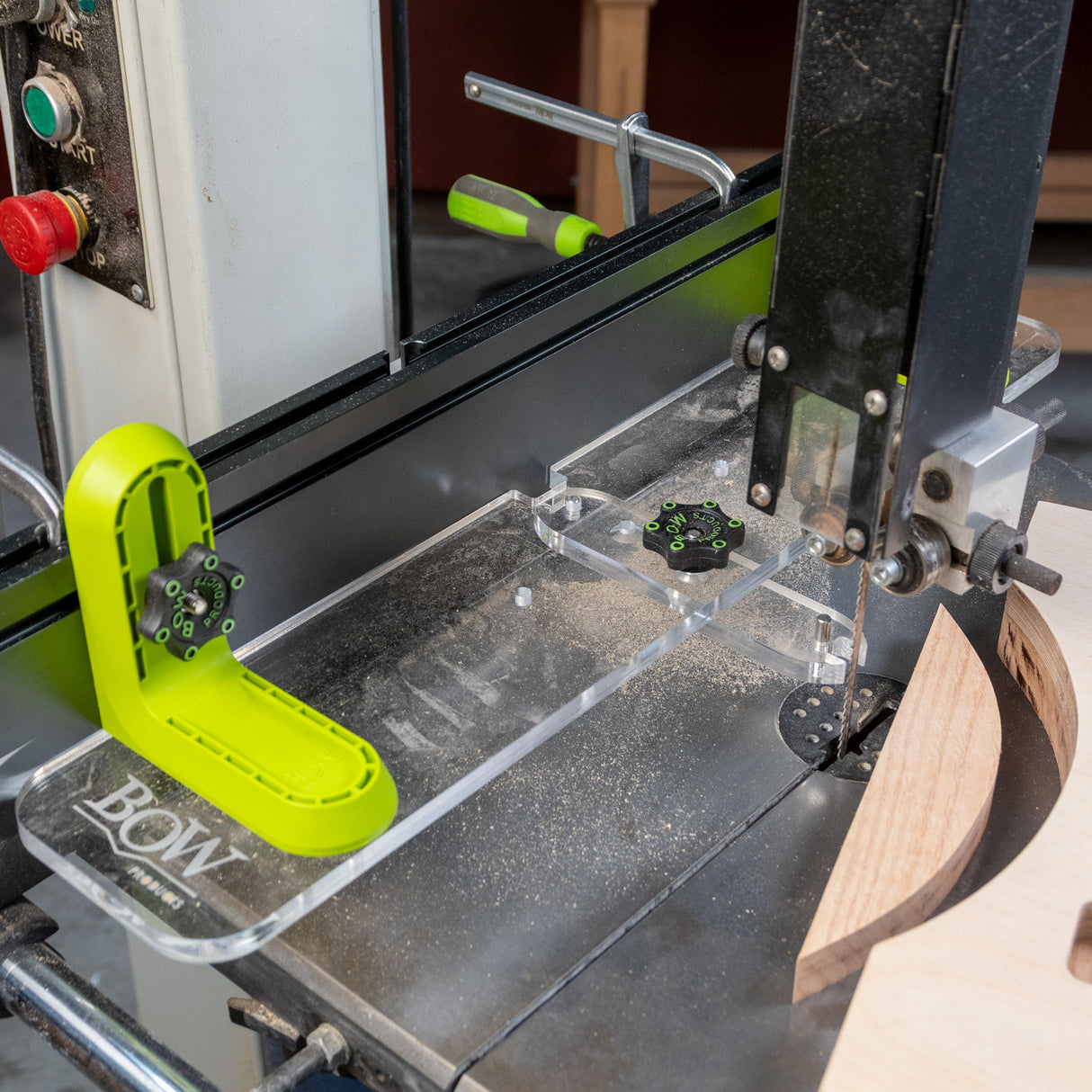 Bandsaw equipped with clear L-fence system and wood guide for precise woodworking cuts