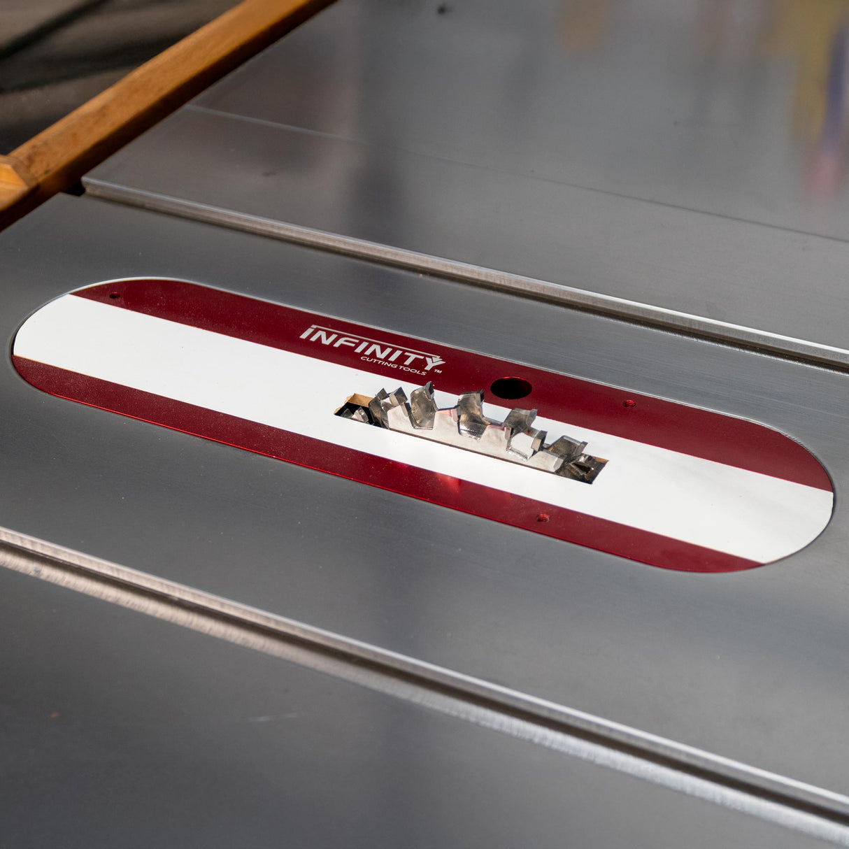 Table saw with dado blade set and zero clearance insert for precise woodworking cuts