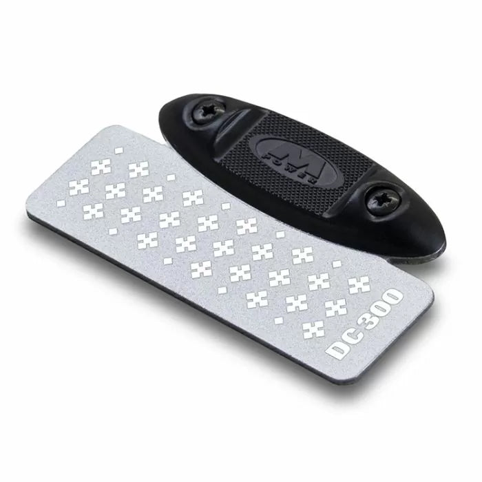 Diamond sharpening stone with textured surface and black handle, labeled DC-300, for woodworking.