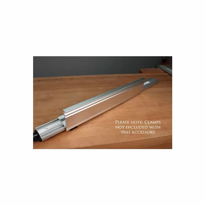 Aluminum woodworking guide rail accessory on a wooden workbench