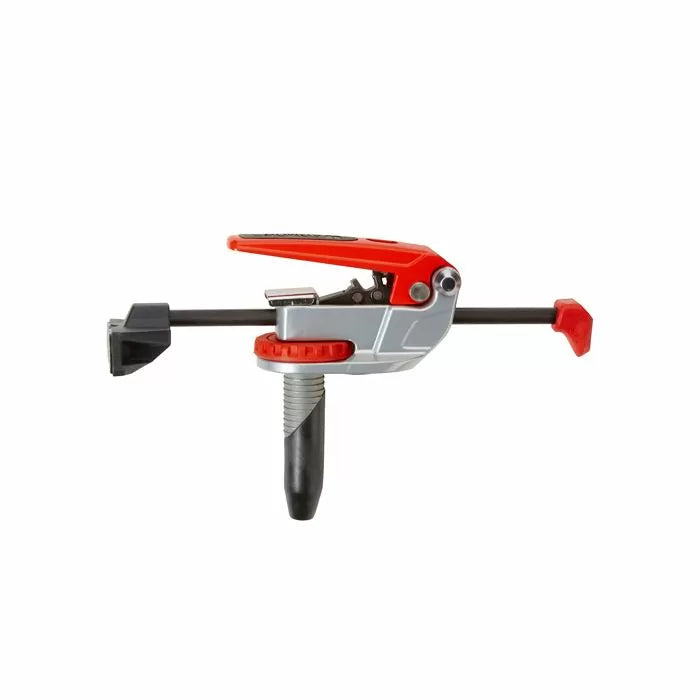 Bench dog clamp with red handle for woodworking and router table use on white background