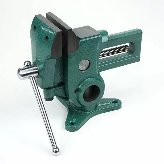 Heavy-duty green woodworking bench vise with swivel base and handle, isolated on white background.