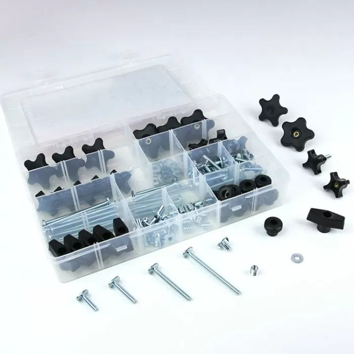 Woodworking jig hardware kit with metal bolts, knobs, washers, and fasteners in organizer box