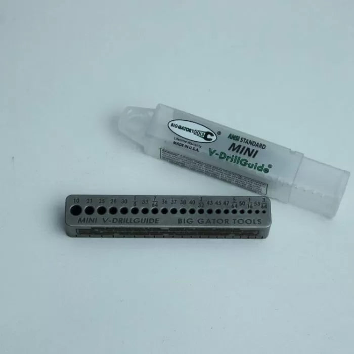 Mini V-drill guide tool with labeled drill holes and plastic storage case for woodworking