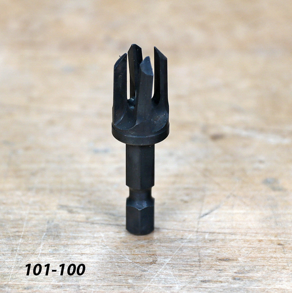 Woodworking countersink drill bit with hex shank on a wooden workbench