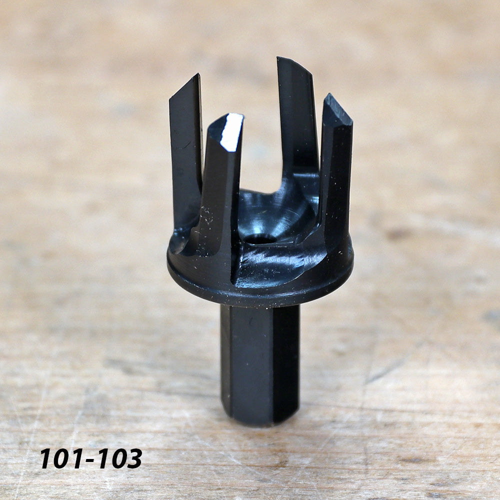 Woodworking tenon cutter with sharp steel blades on a wooden workbench, tool ID 101-103