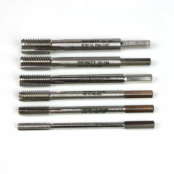 Set of six metal woodworking threading taps arranged on a white background