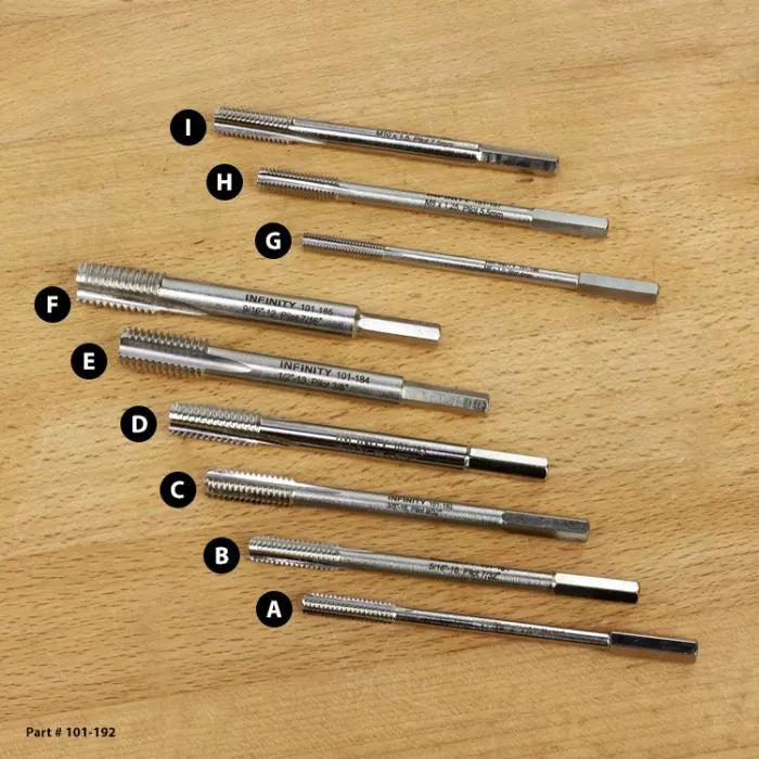 Set of nine metal thread cutting taps labeled A–I on a wooden surface, used for woodworking projects.