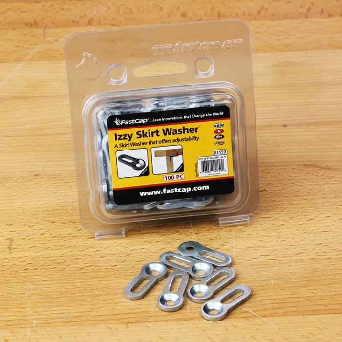 Pack of Izzy Skirt Washer metal woodworking hardware with washers on wooden surface