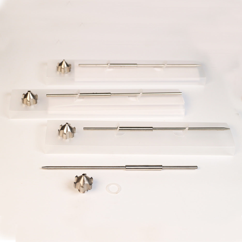 Precision woodworking countersink drill bits and shafts on white background