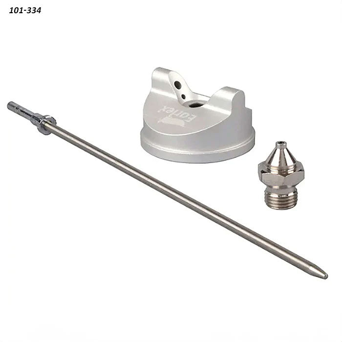 Metal spray gun tip kit with nozzle, air cap, and needle on white background