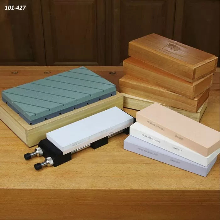 Sharpening stones and honing blocks for woodworking tool maintenance on a workbench