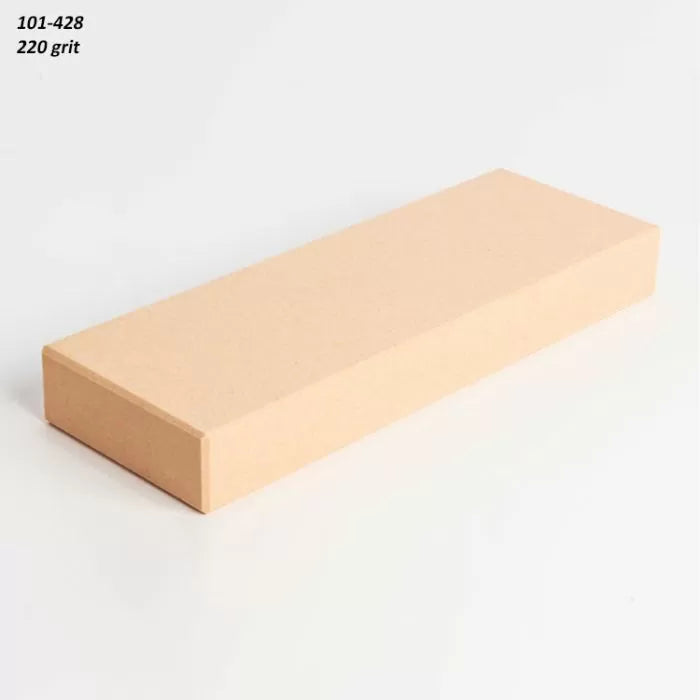 Rectangular 220 grit sharpening stone for woodworking tools on white background