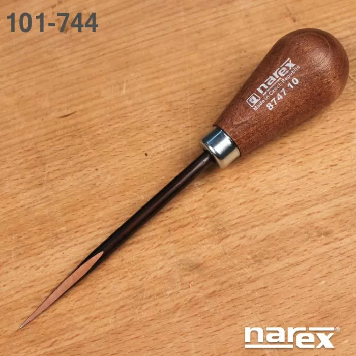 Woodworking marking awl tool with wooden handle on a workbench