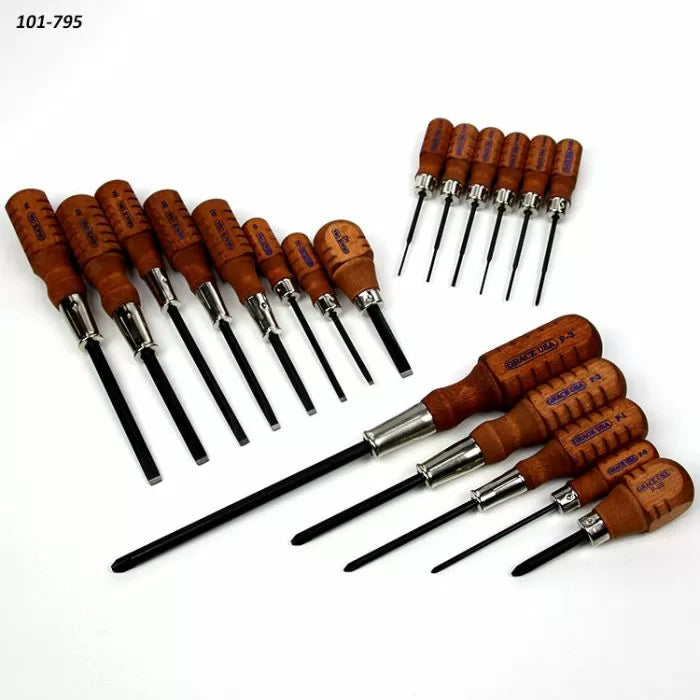 Woodworking screwdrivers set with wooden handles arranged on white background