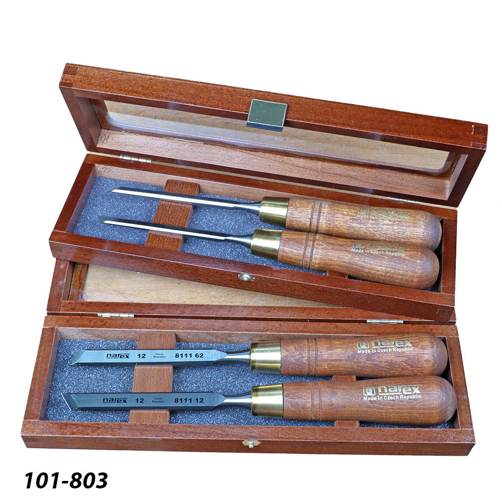 Set of four Narex wood carving chisels with wooden handles in a wooden case