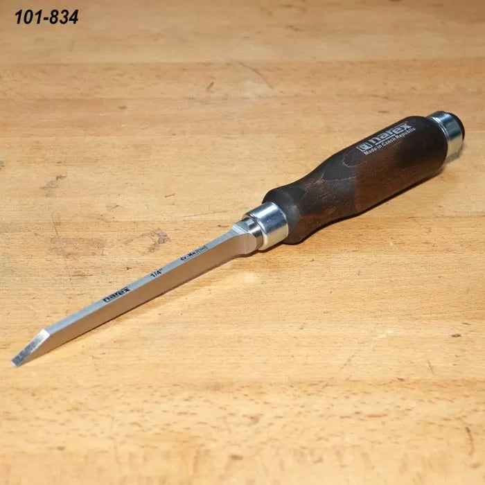 Woodworking chisel with dark wooden handle on workbench, precision hand tool