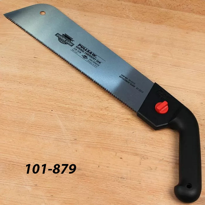 Japanese pull saw with black handle and angled blade on a wooden workbench