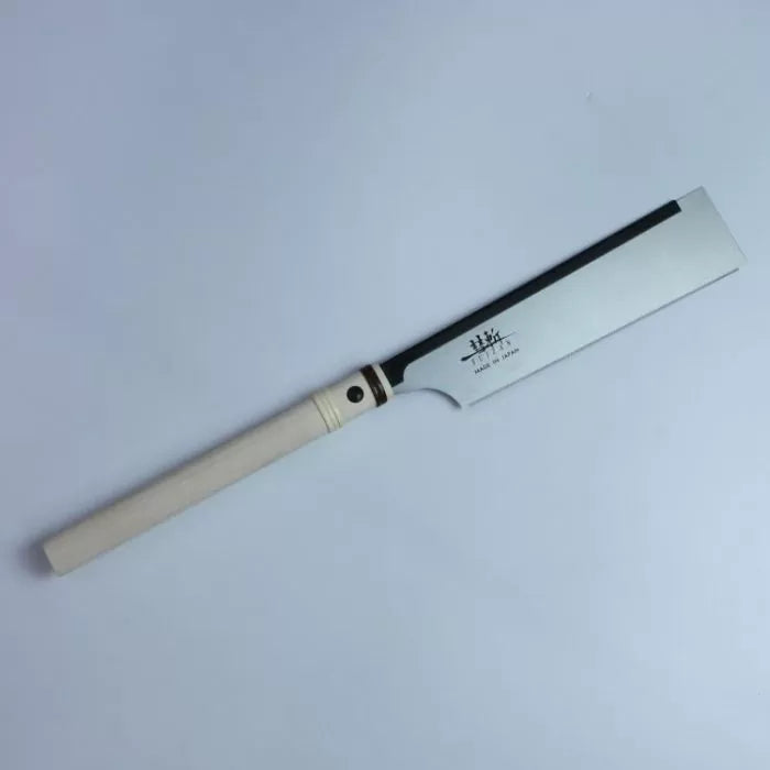 Japanese pull saw with wooden handle and fine-toothed blade for precision woodworking cuts